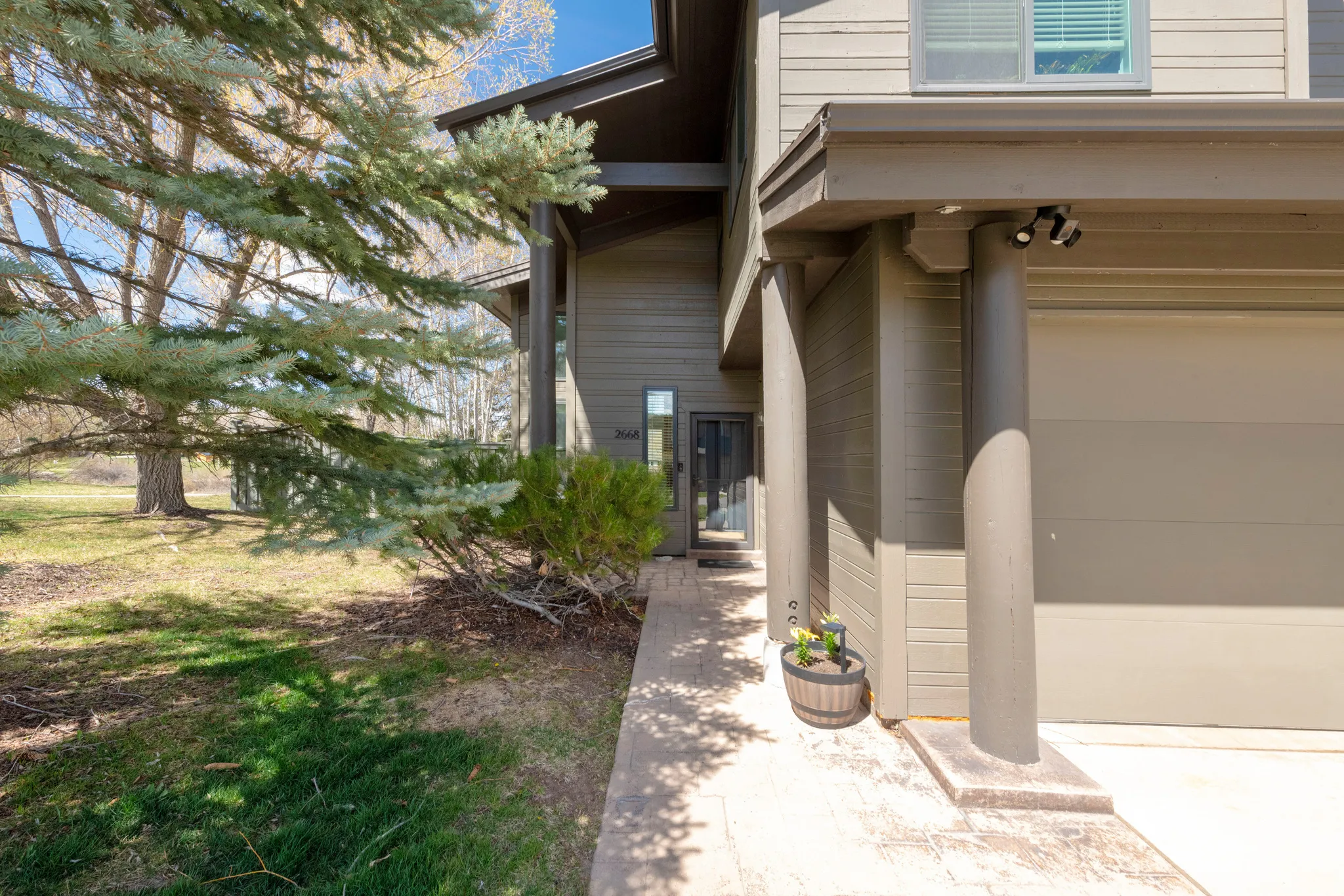 Property entrance featuring a garage
