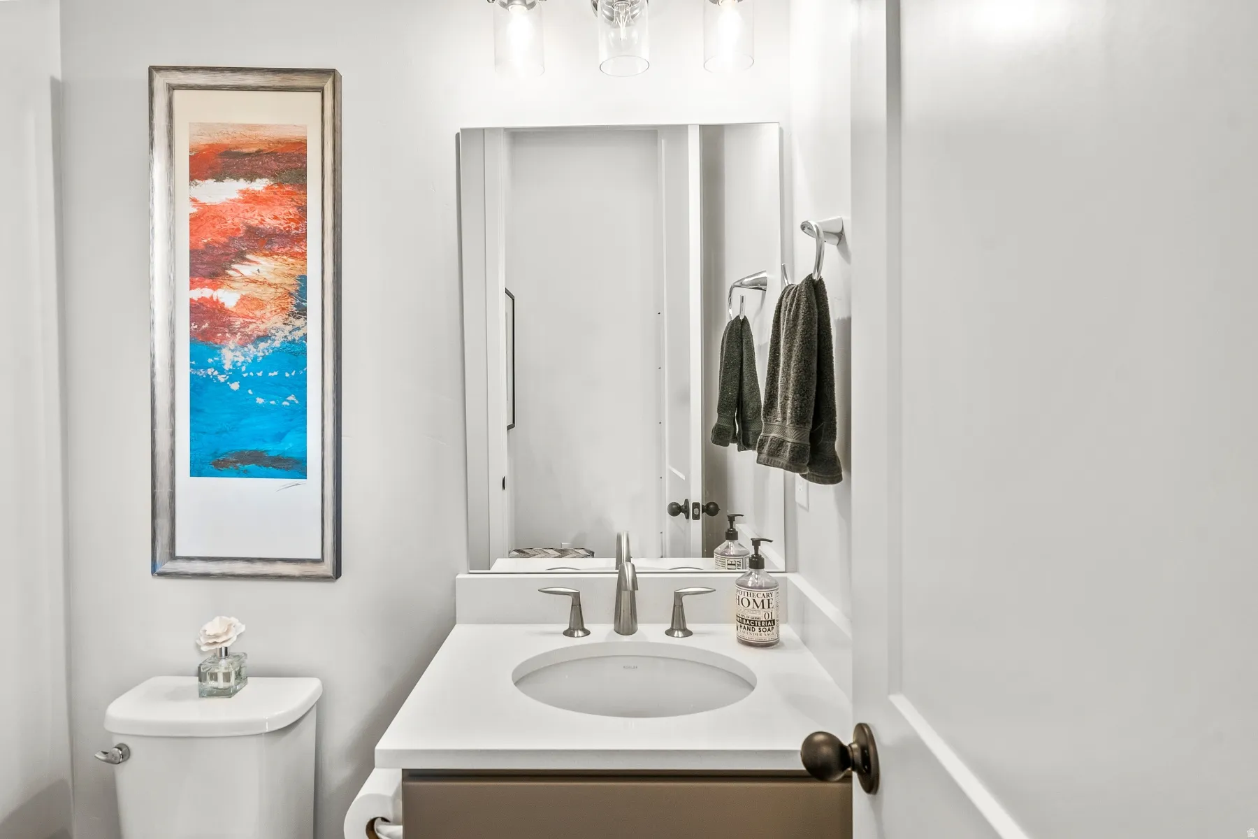 Bathroom featuring toilet and vanity