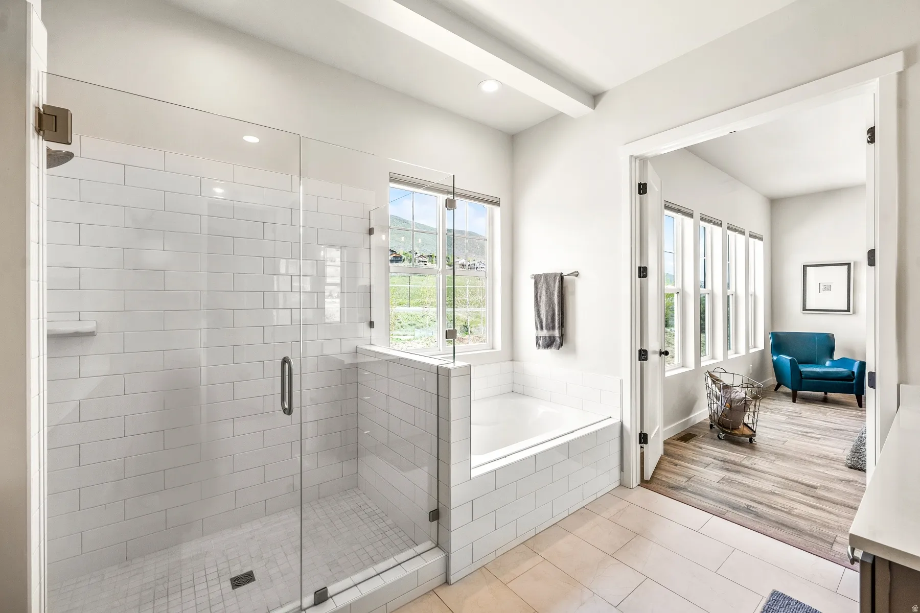 Full bathroom featuring a stall shower, light tile patterned floors, a bath, and recessed lighting