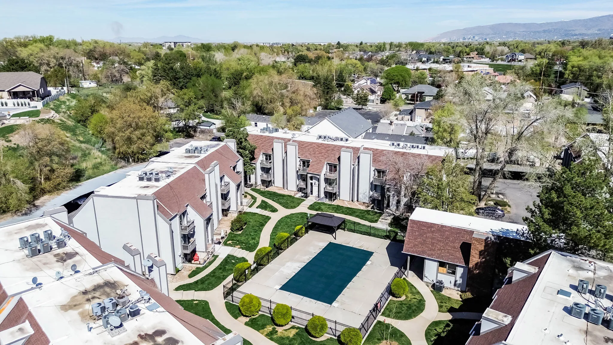 Aerial view of residential area with a mountain backdrop