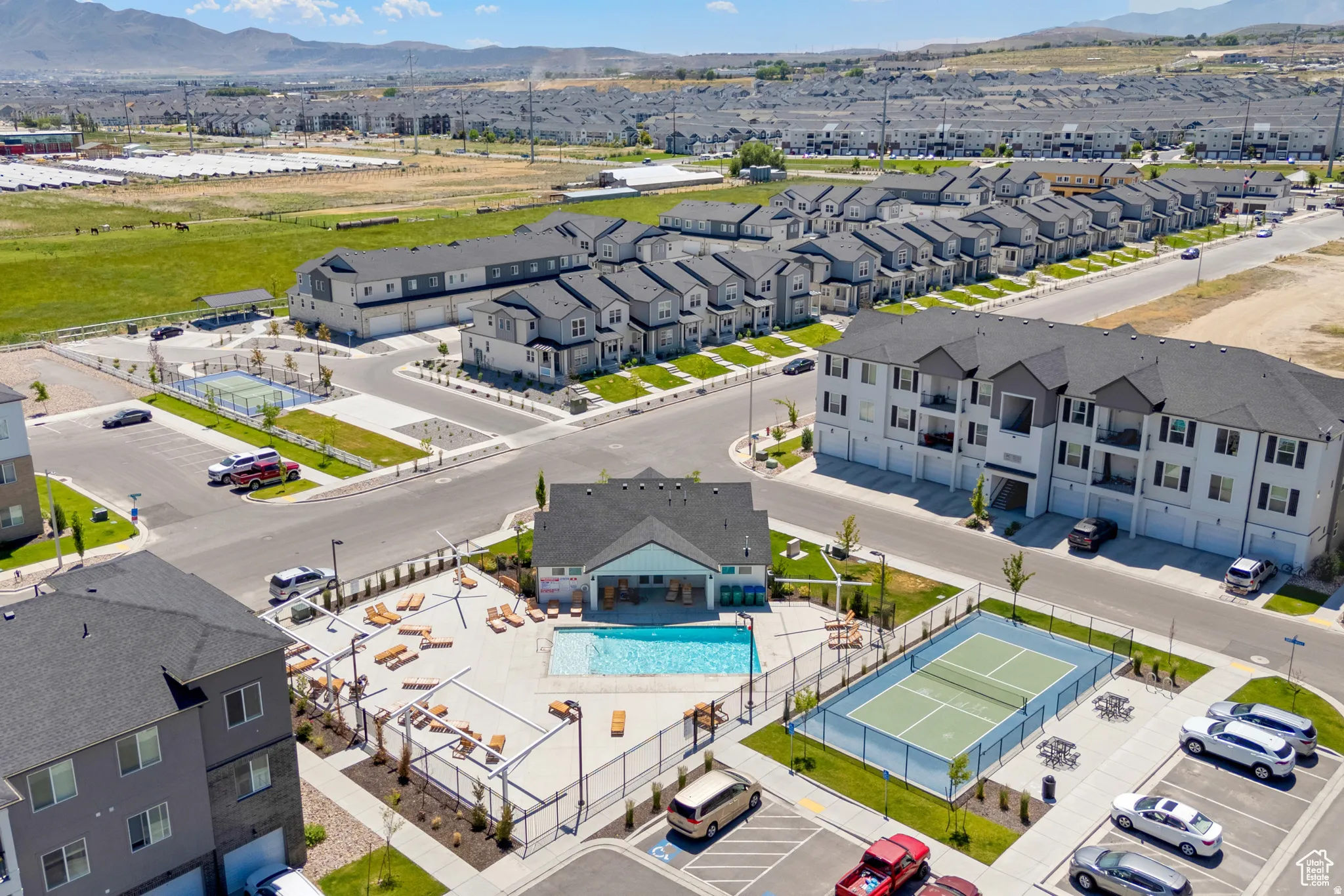 Aerial view of a mountainous background and a pool