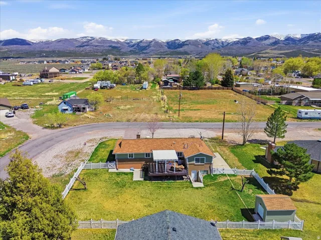 Aerial view of residential area featuring mountains