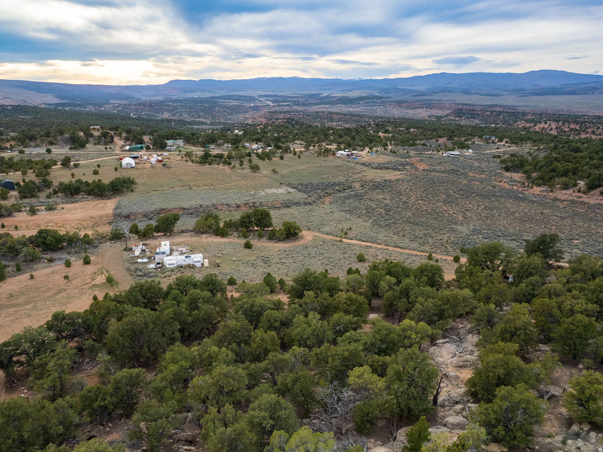 Overview of rural landscape featuring mountains