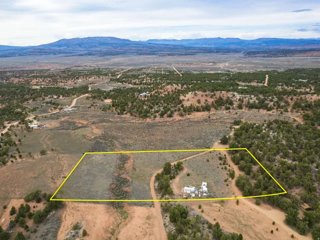 Overview of rural landscape featuring mountains and property boundaries highlighted
