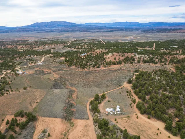 Aerial view of sparsely populated area with mountains