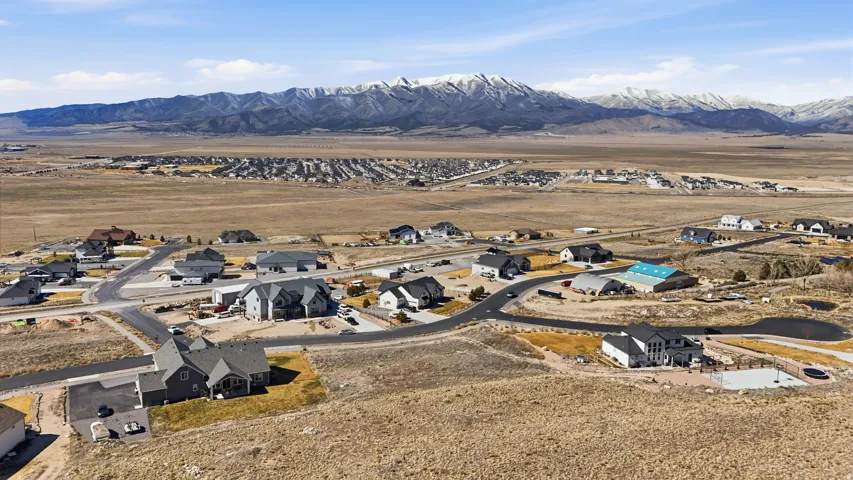 Aerial perspective of suburban area with mountains