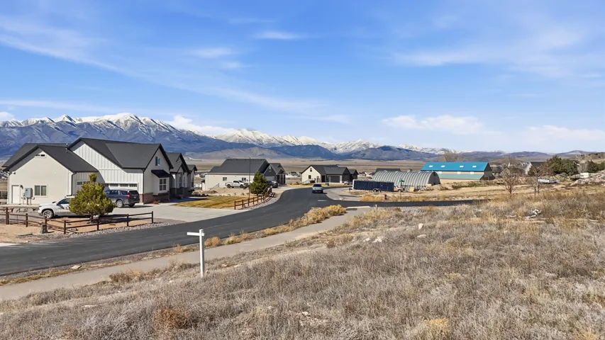 View of mountain backdrop with nearby suburban area