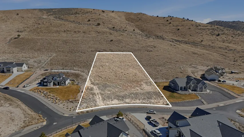 Aerial view of property's location with property boundaries highlighted and nearby suburban area