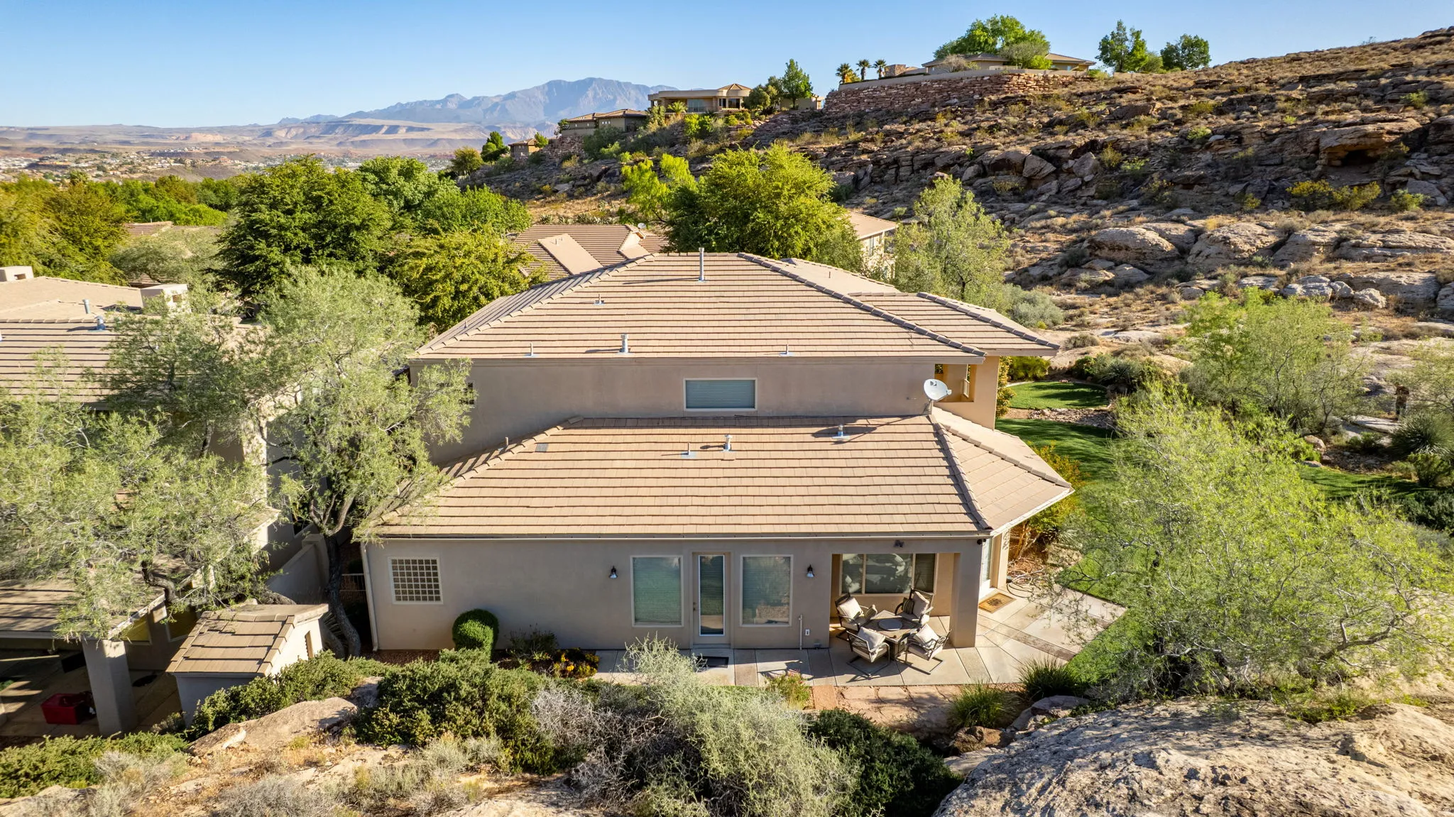 View of subject property with a mountain backdrop