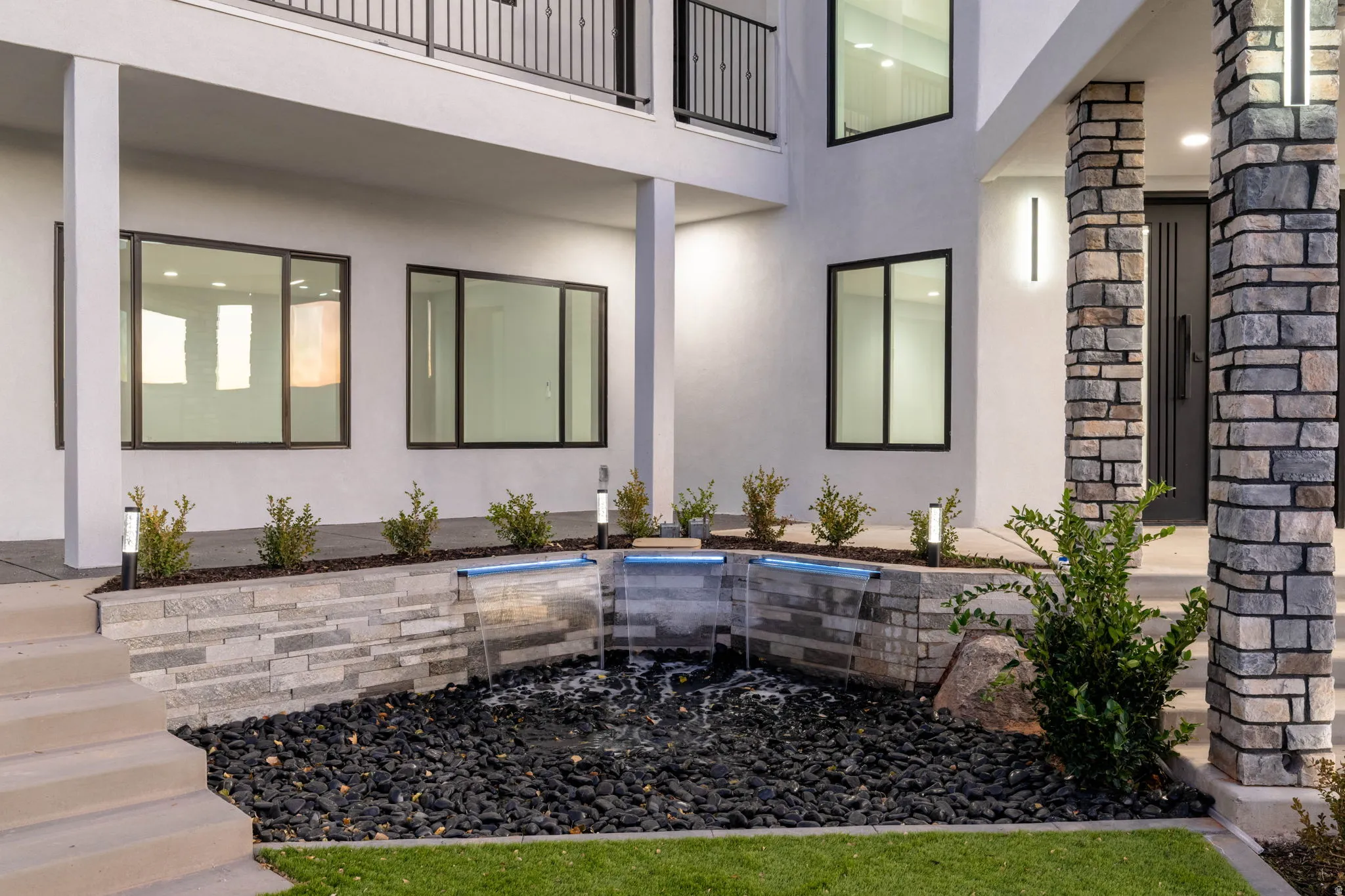 Exterior space featuring stucco siding and a patio area