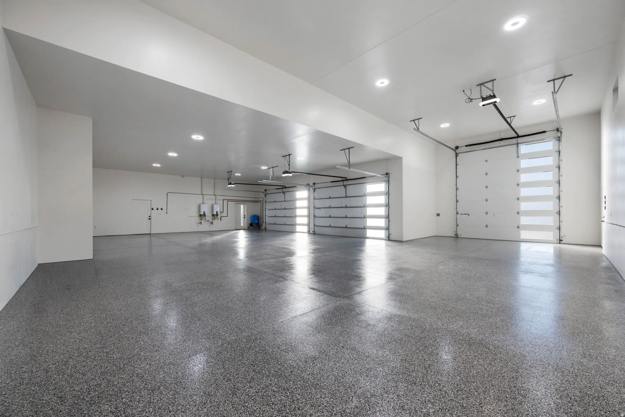Garage featuring recessed lighting