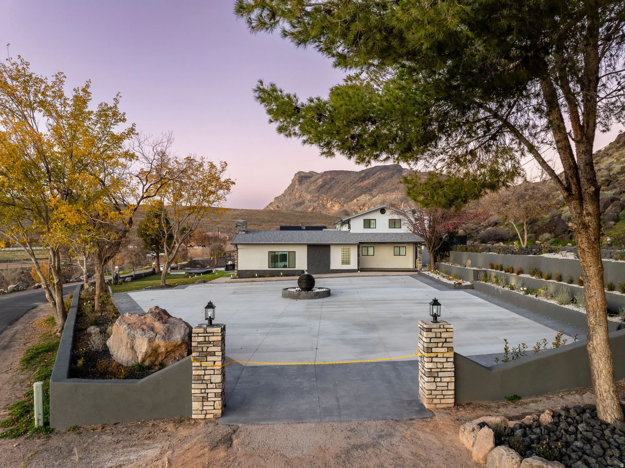 Traditional-style house with roof mounted solar panels and a mountain view