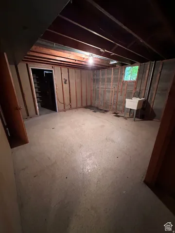 Below grade area with a sink
