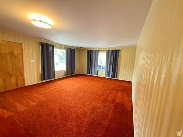 View of carpeted spare room