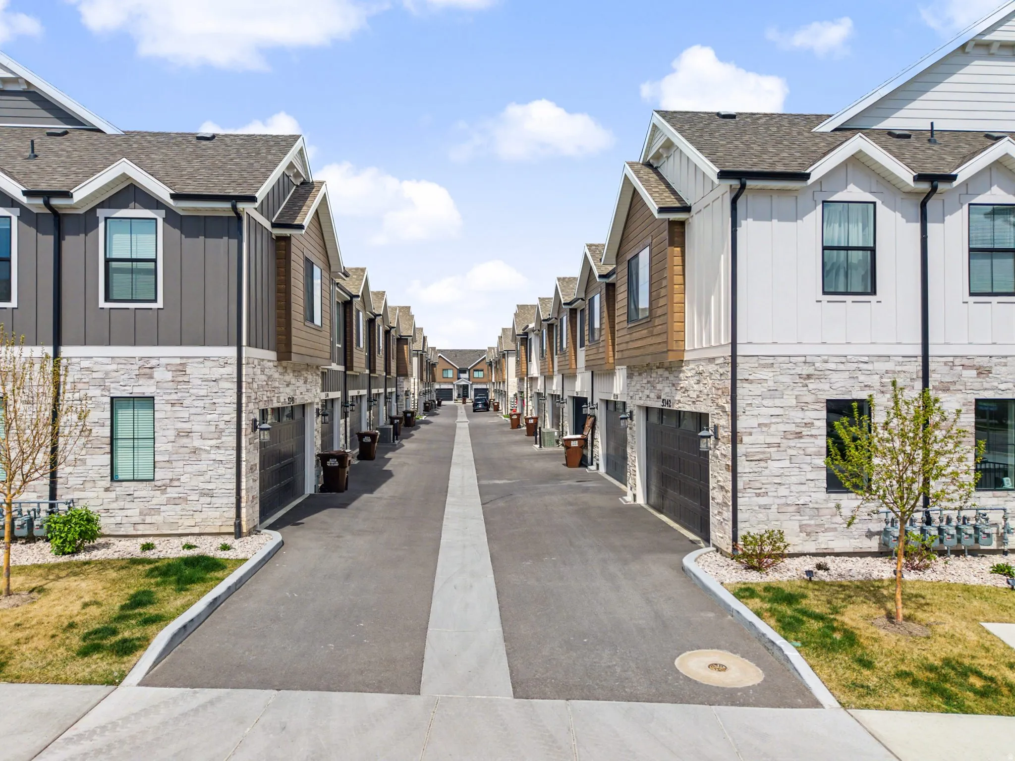 View of concrete road with a residential view