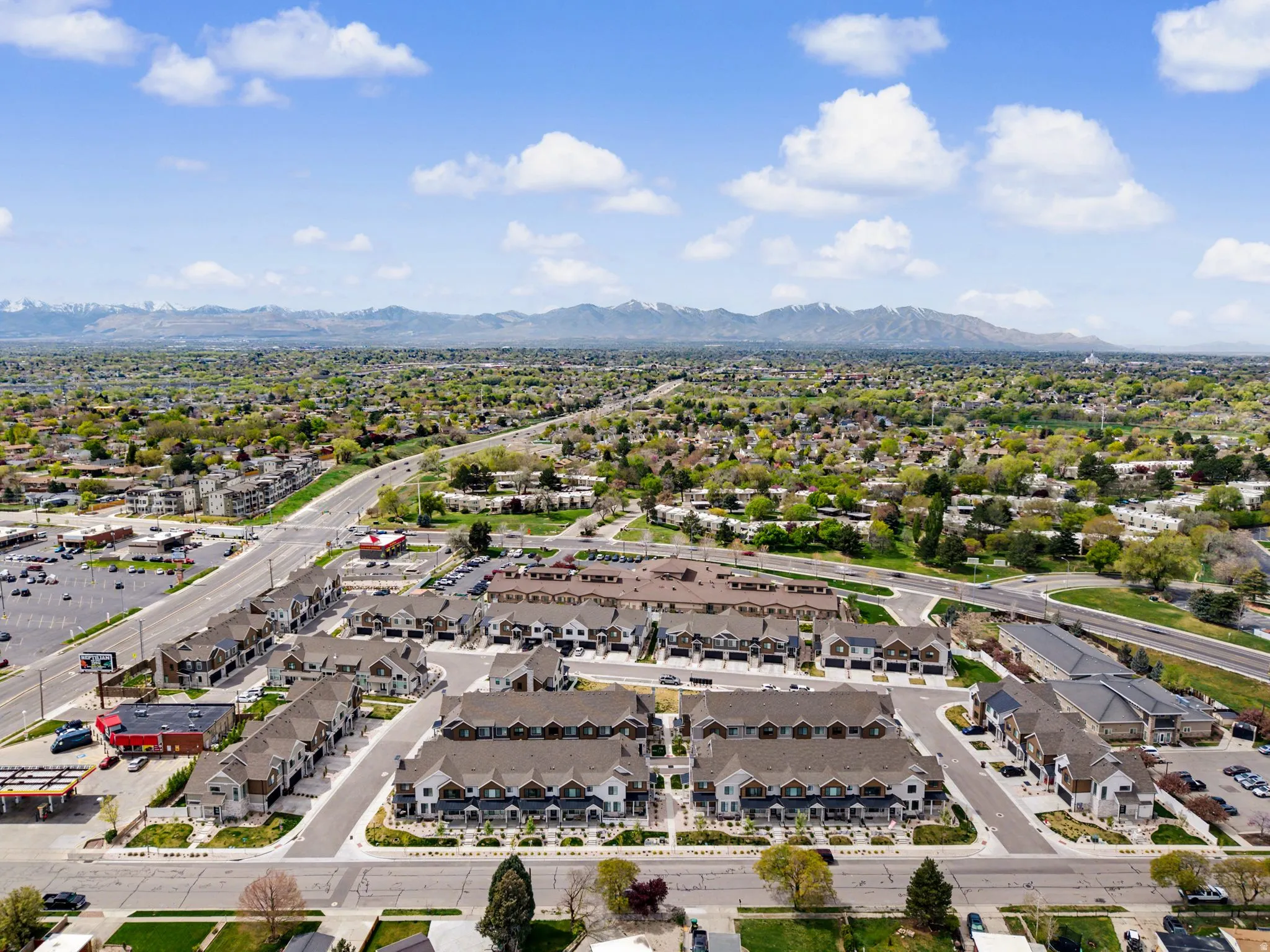 Aerial perspective of suburban area featuring mountains