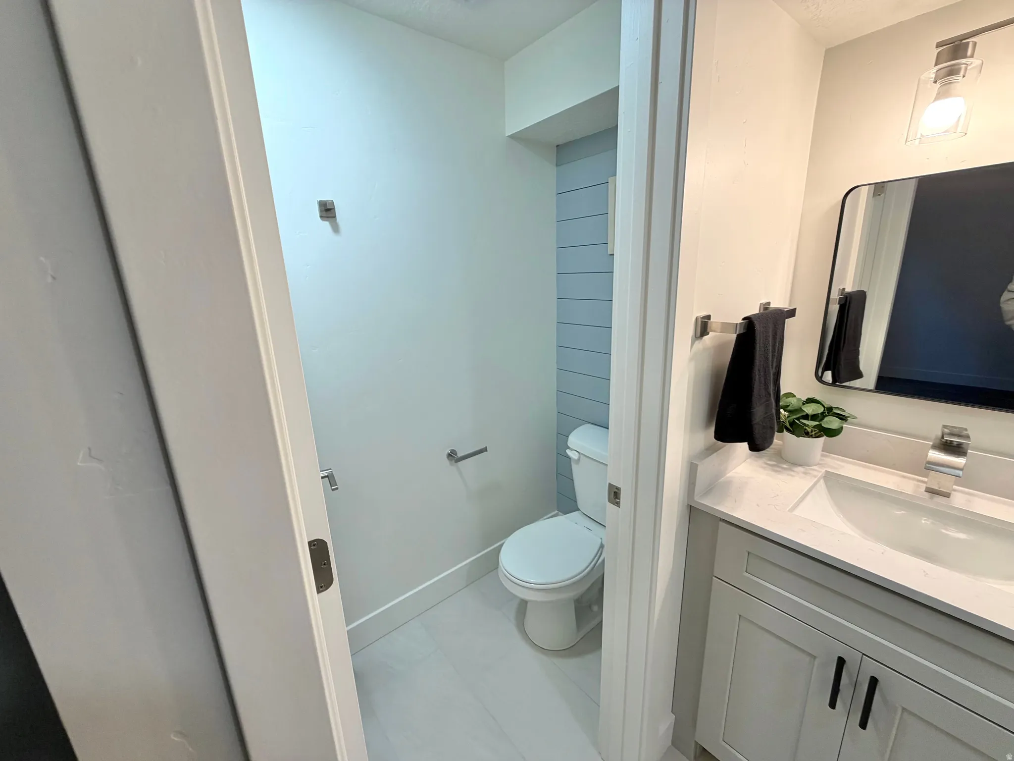 Bathroom with toilet and vanity