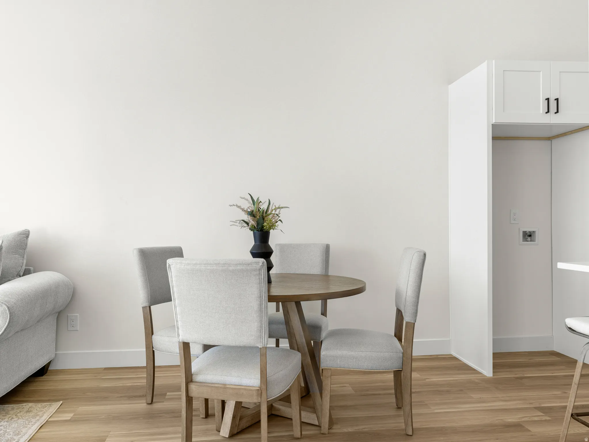 Dining space with light wood finished floors