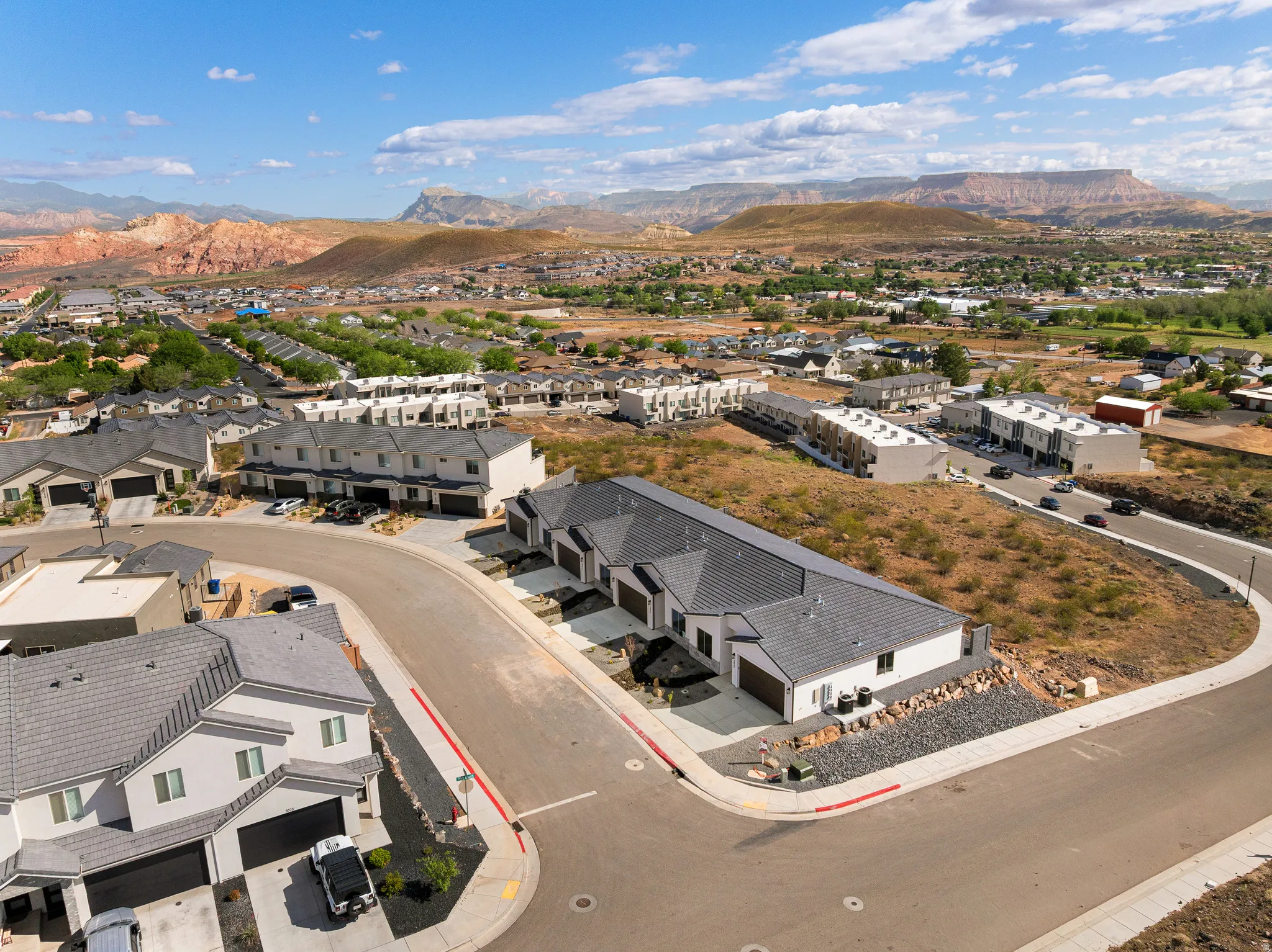 Aerial perspective of suburban area featuring mountains