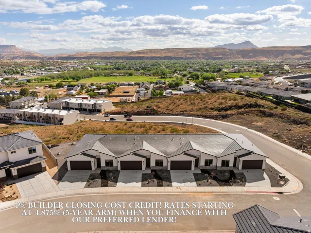 Modern new construction residences featuring contemporary architectural design and attached garages