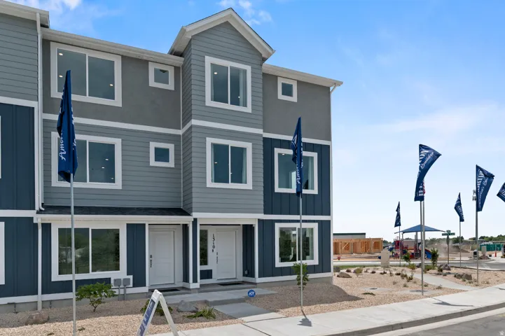 Contemporary home featuring board and batten siding