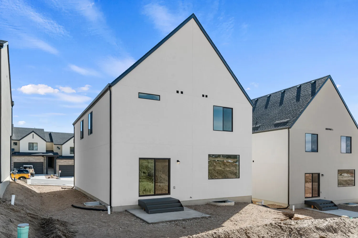 Back of property with entry steps