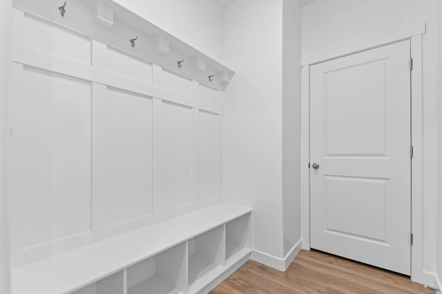 Mudroom with light wood-type flooring