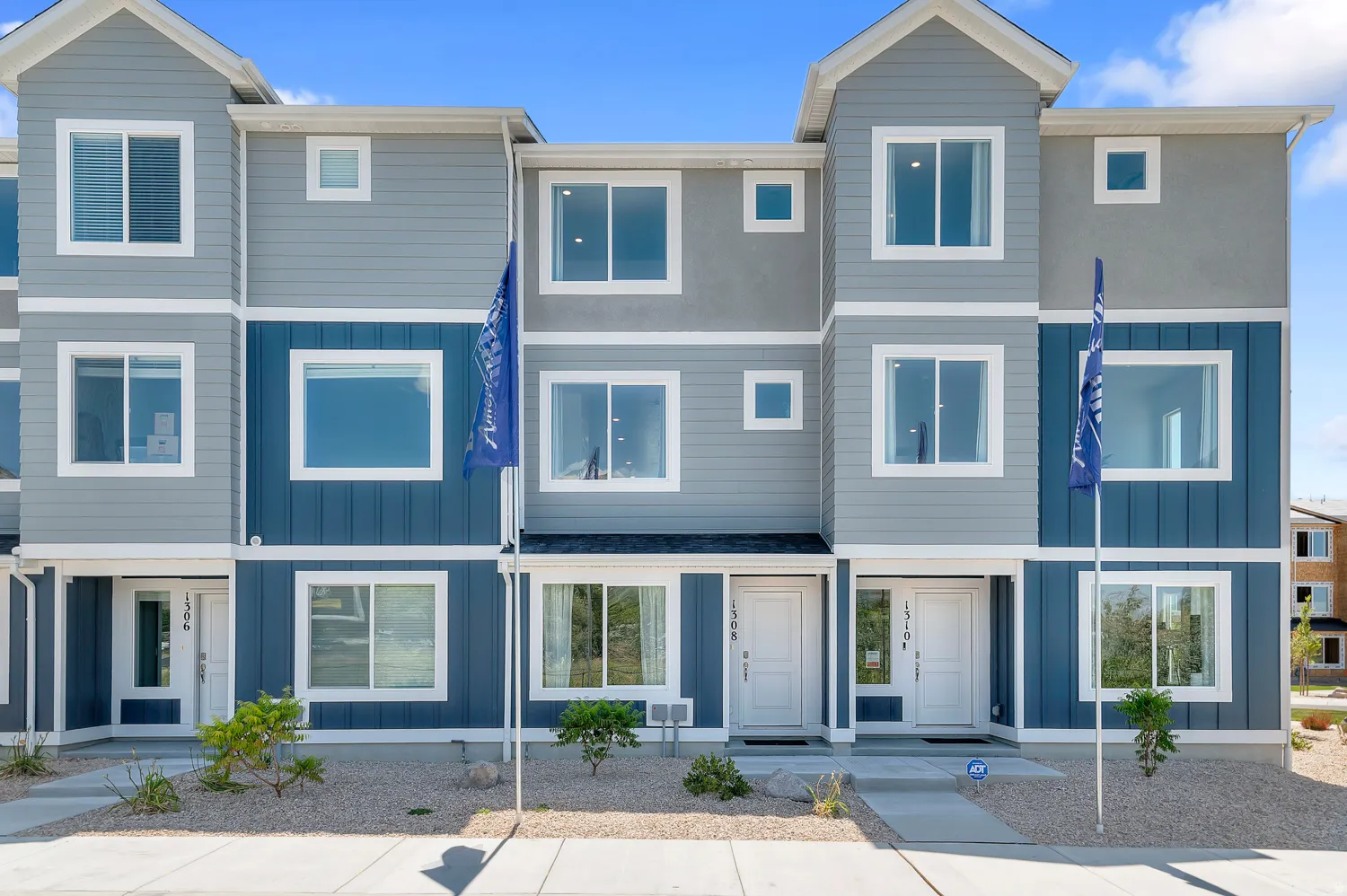 Modern home featuring board and batten siding and a residential view