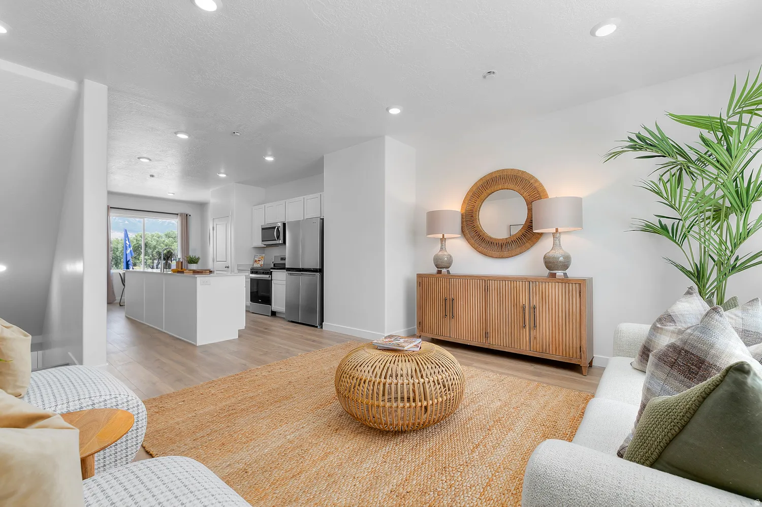 Living room featuring light wood-style floors and recessed lighting