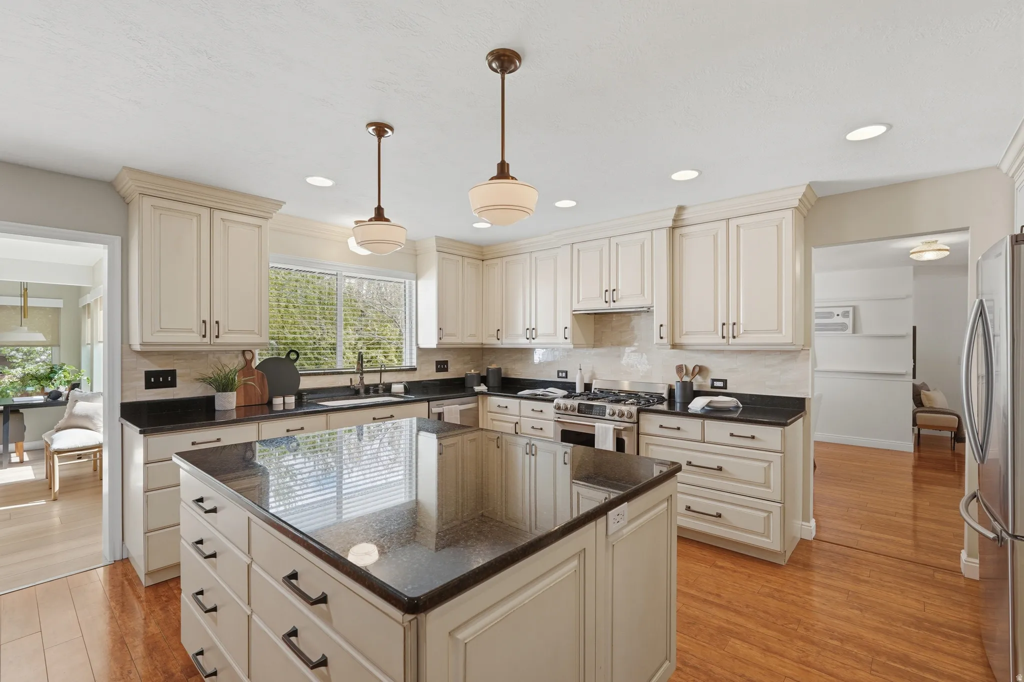 Kitchen looking towards sunroom to the left, and dining room to the right