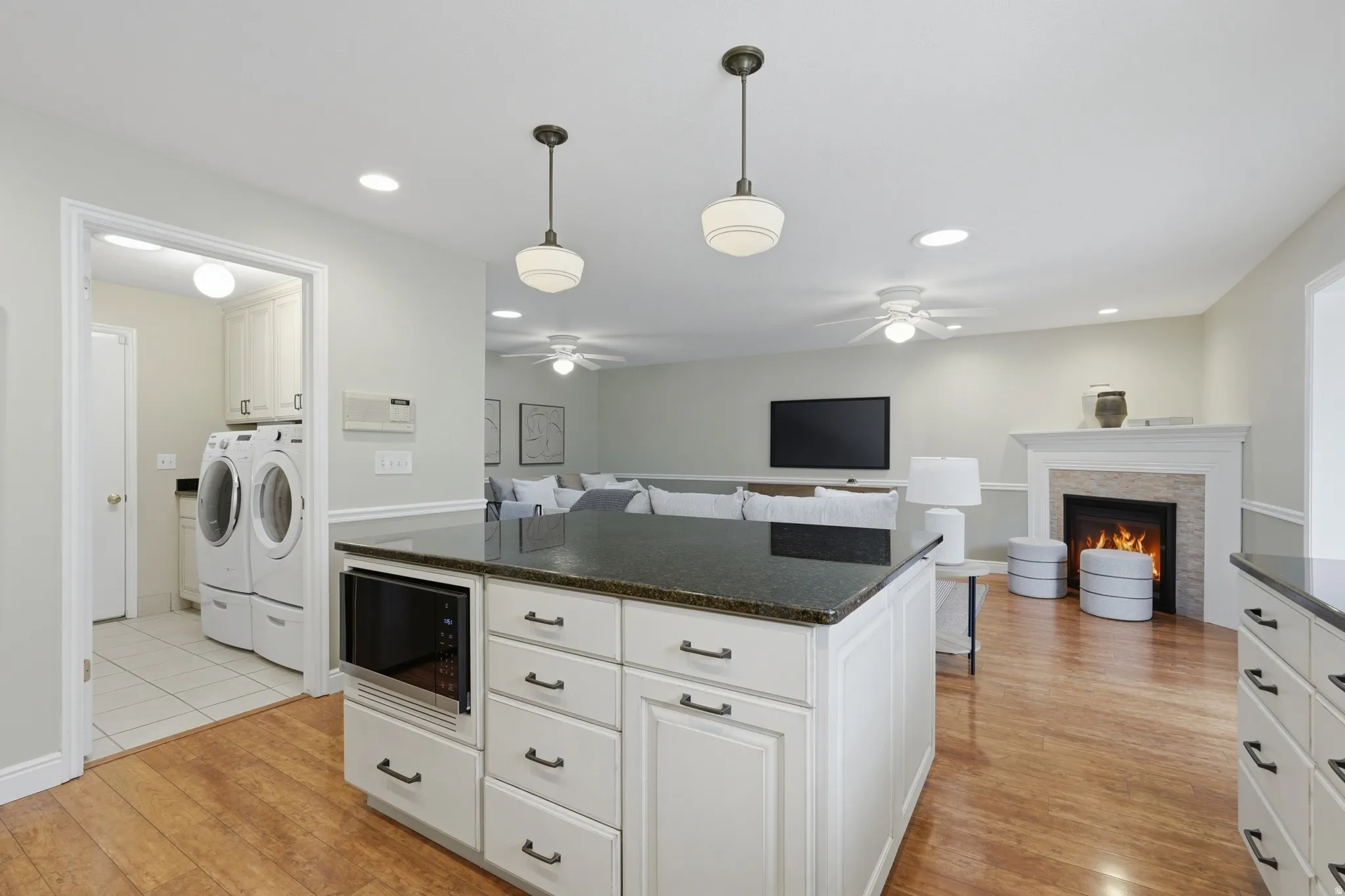 Kitchen looking towards family room and laundry room