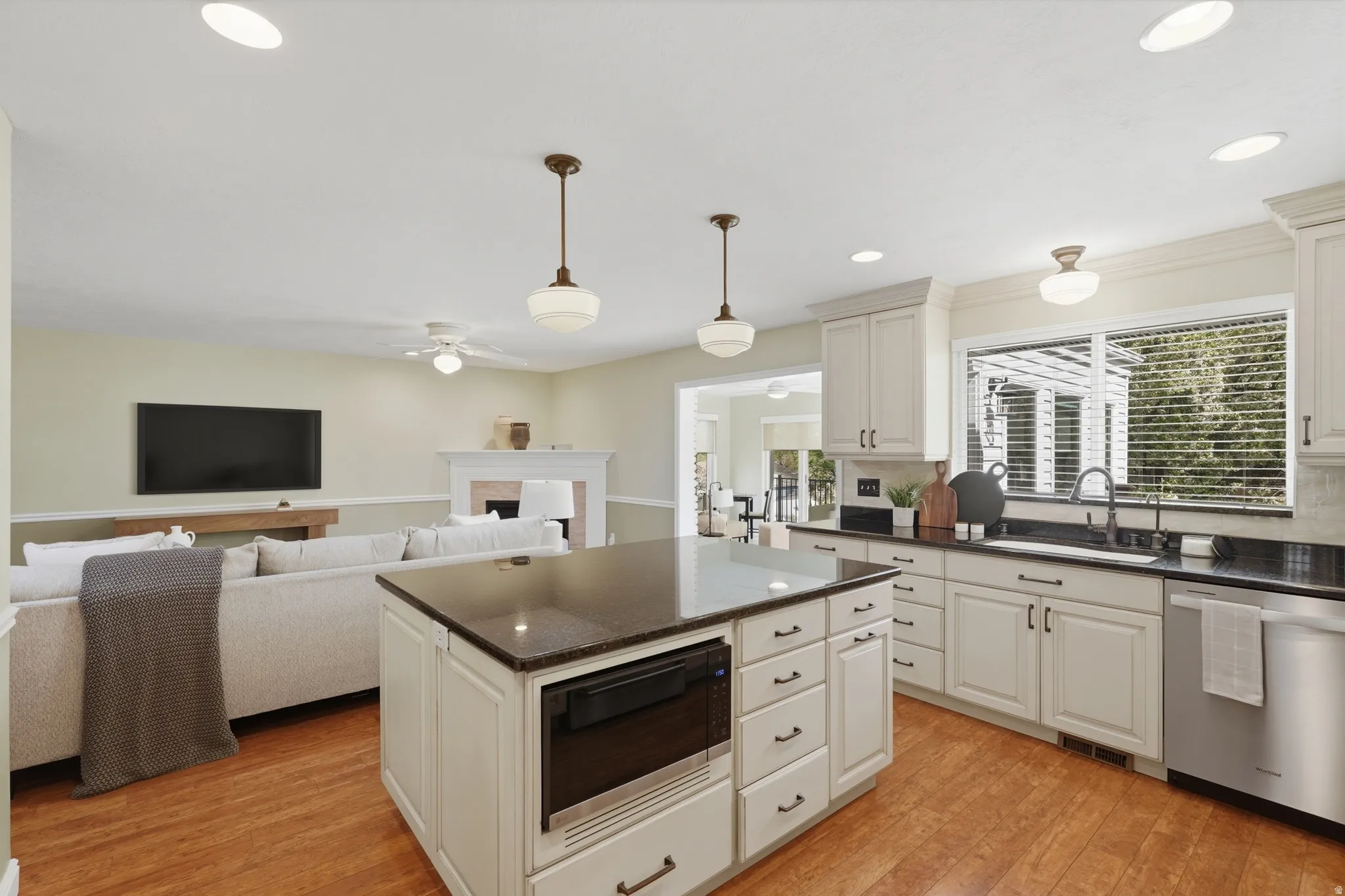 Kitchen looking towards family room and sunroom