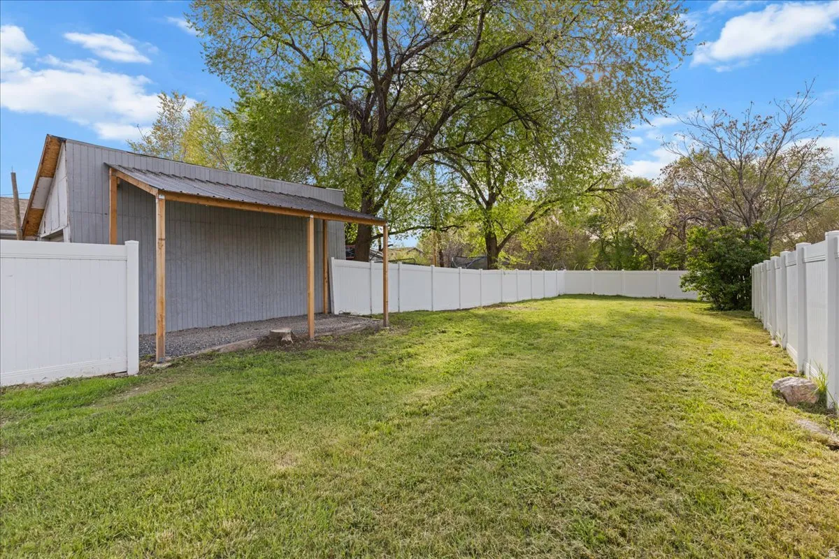View of fenced backyard