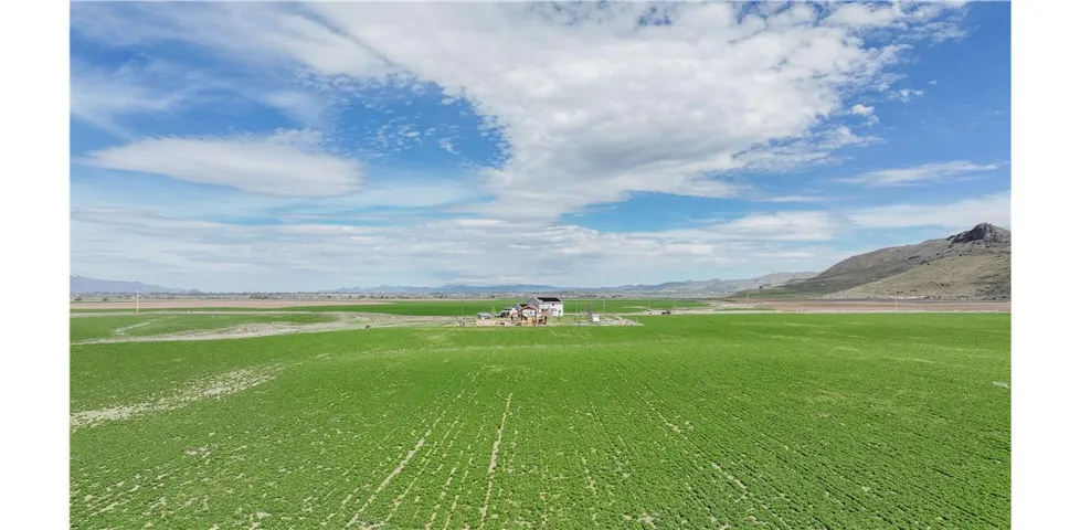 View of property's community featuring a mountain view and a rural view