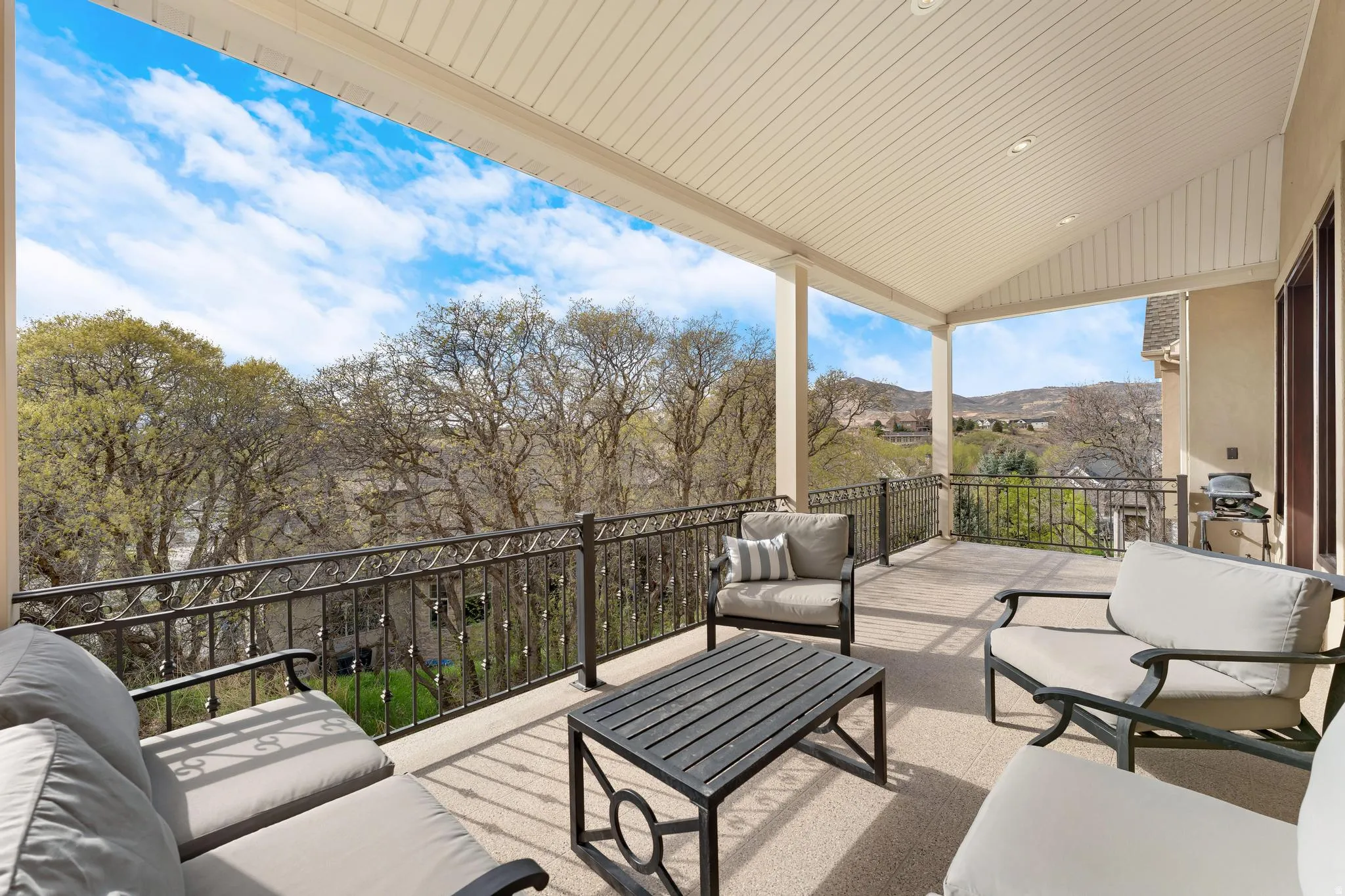 View of patio / terrace with an outdoor living space and a mountain view