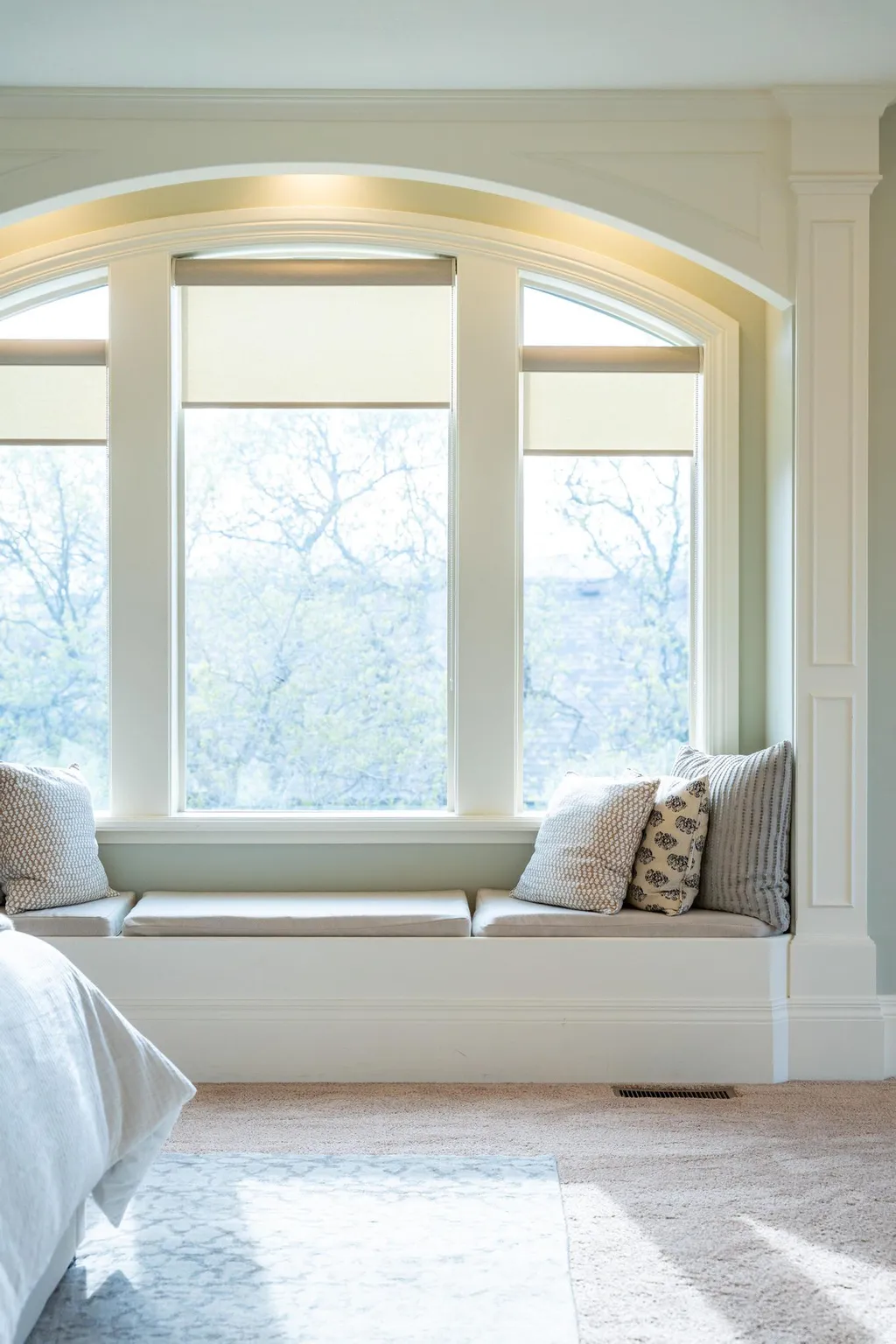 Sitting room with healthy amount of natural light and carpet floors