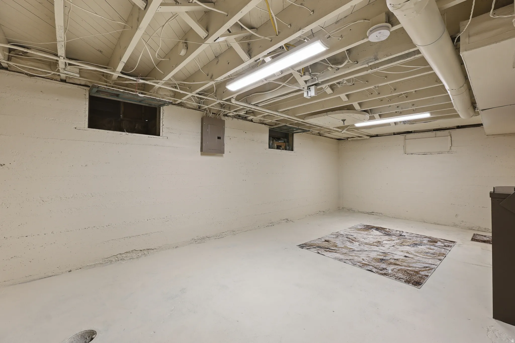 Spacious unfinished basement offering potential for customization