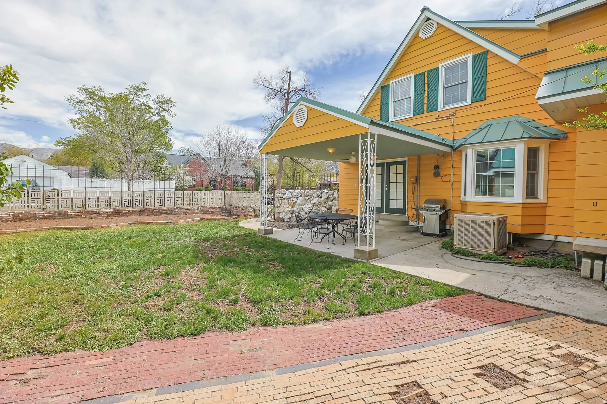 Rear view of property featuring french doors