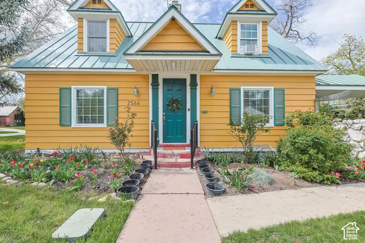 View of front of home with a standing seam roof