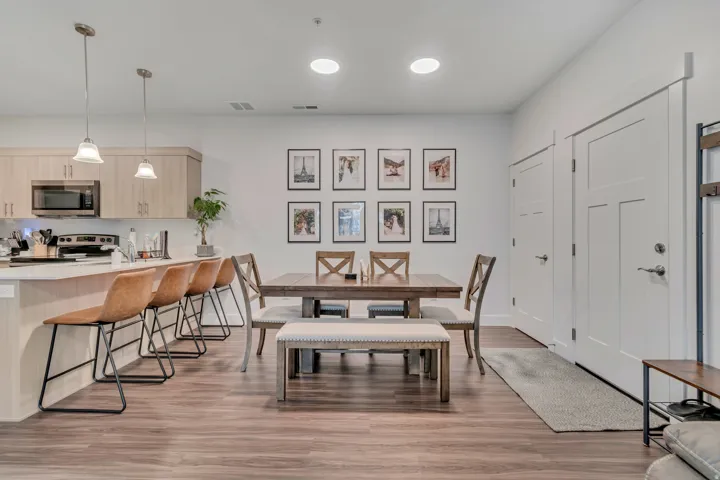 Dining space with light wood-style floors