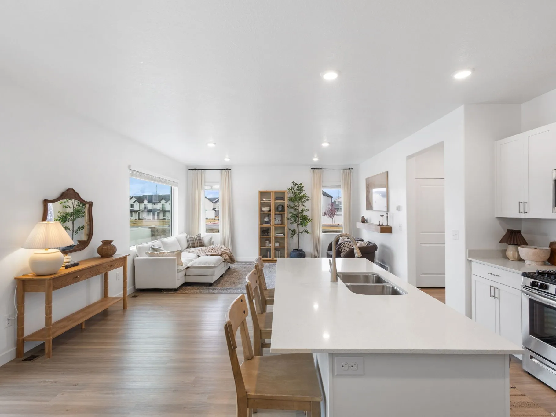 Spacious open concept kitchen featuring natural light