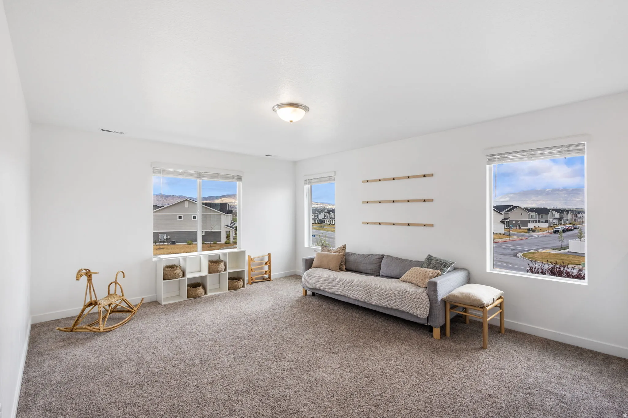 Upstairs living area with views and natural light