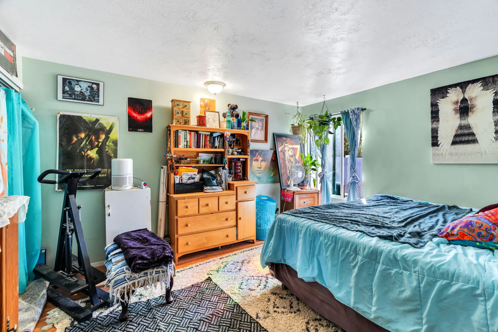 Bedroom featuring a textured ceiling