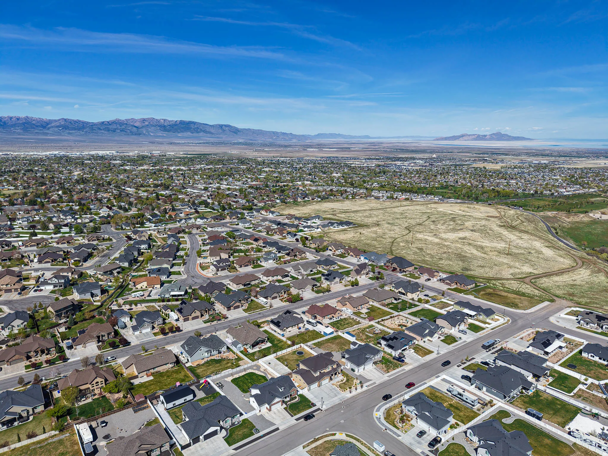 Aerial perspective of suburban area with mountains