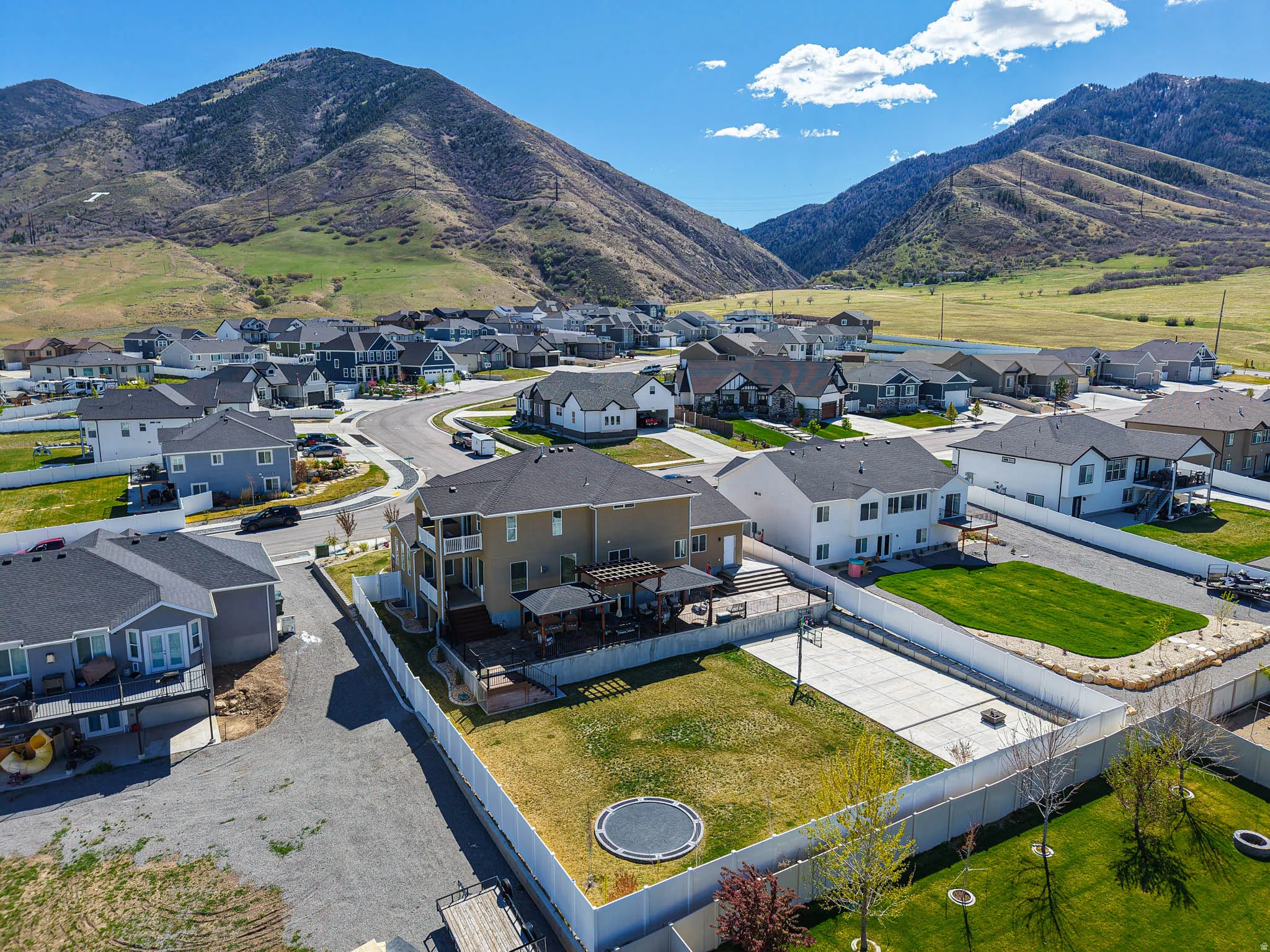 Aerial view of residential area featuring mountains
