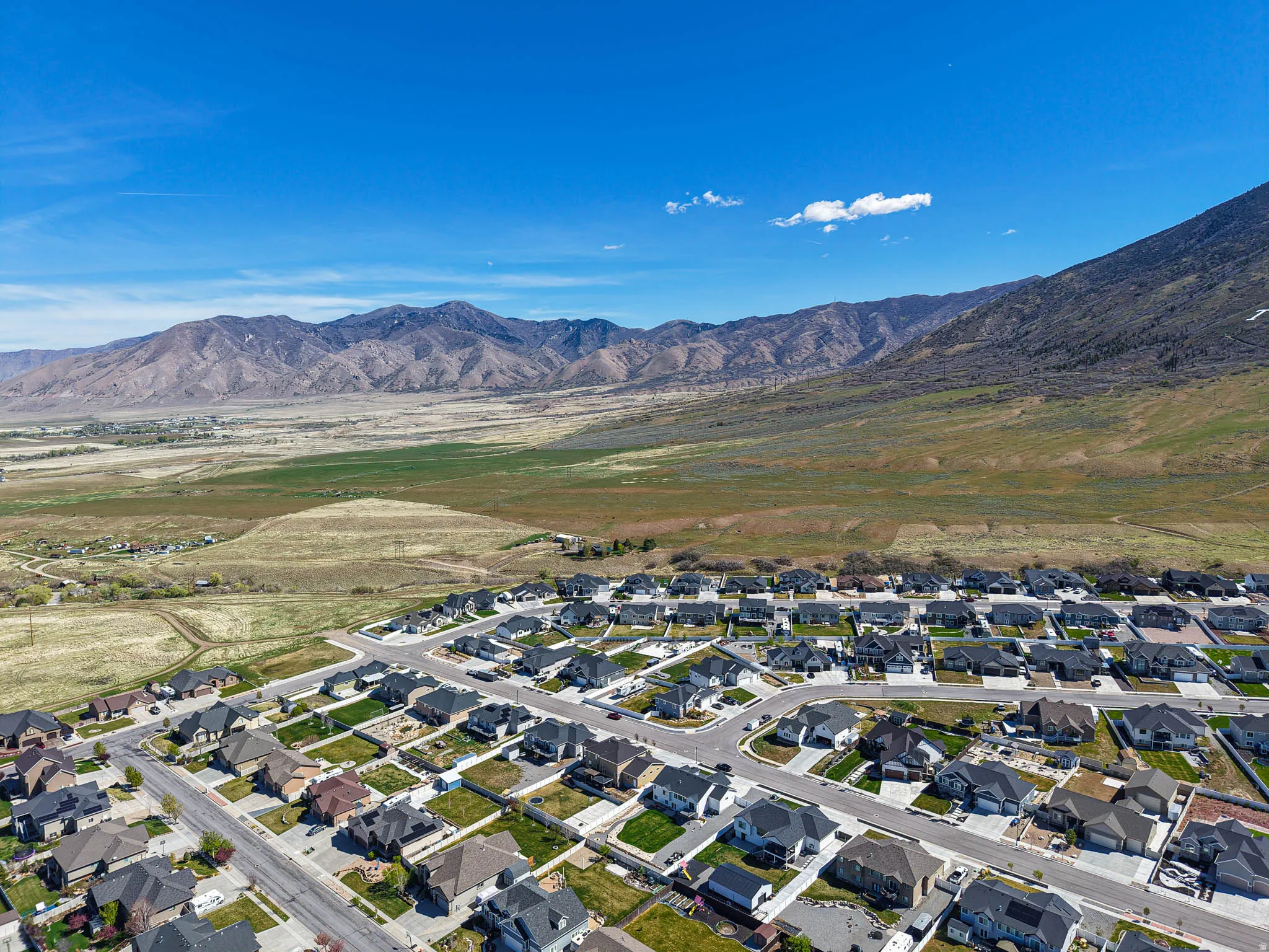 Aerial perspective of suburban area with mountains