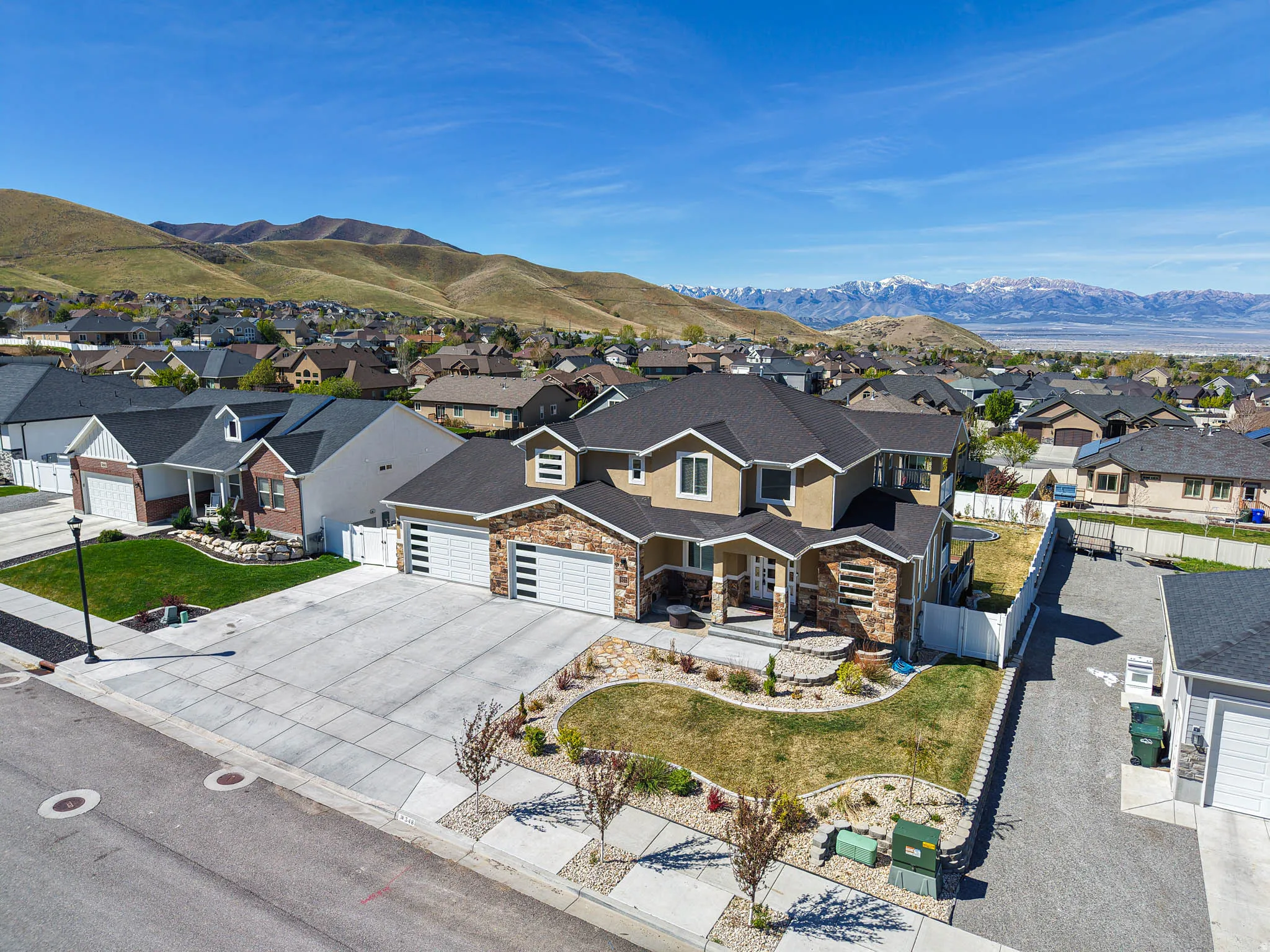 Aerial view of residential area with a mountainous background