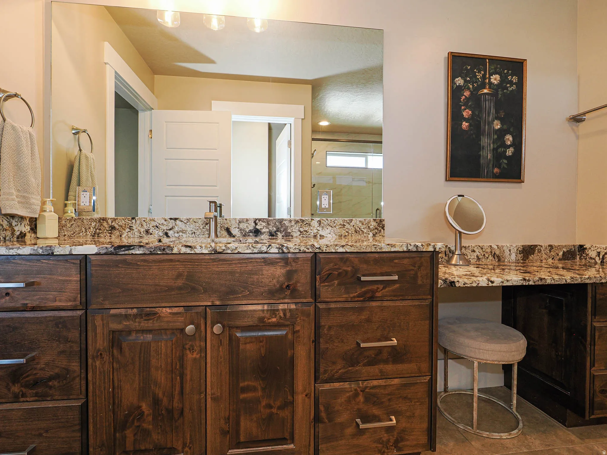 Full bathroom with vanity and tile patterned flooring