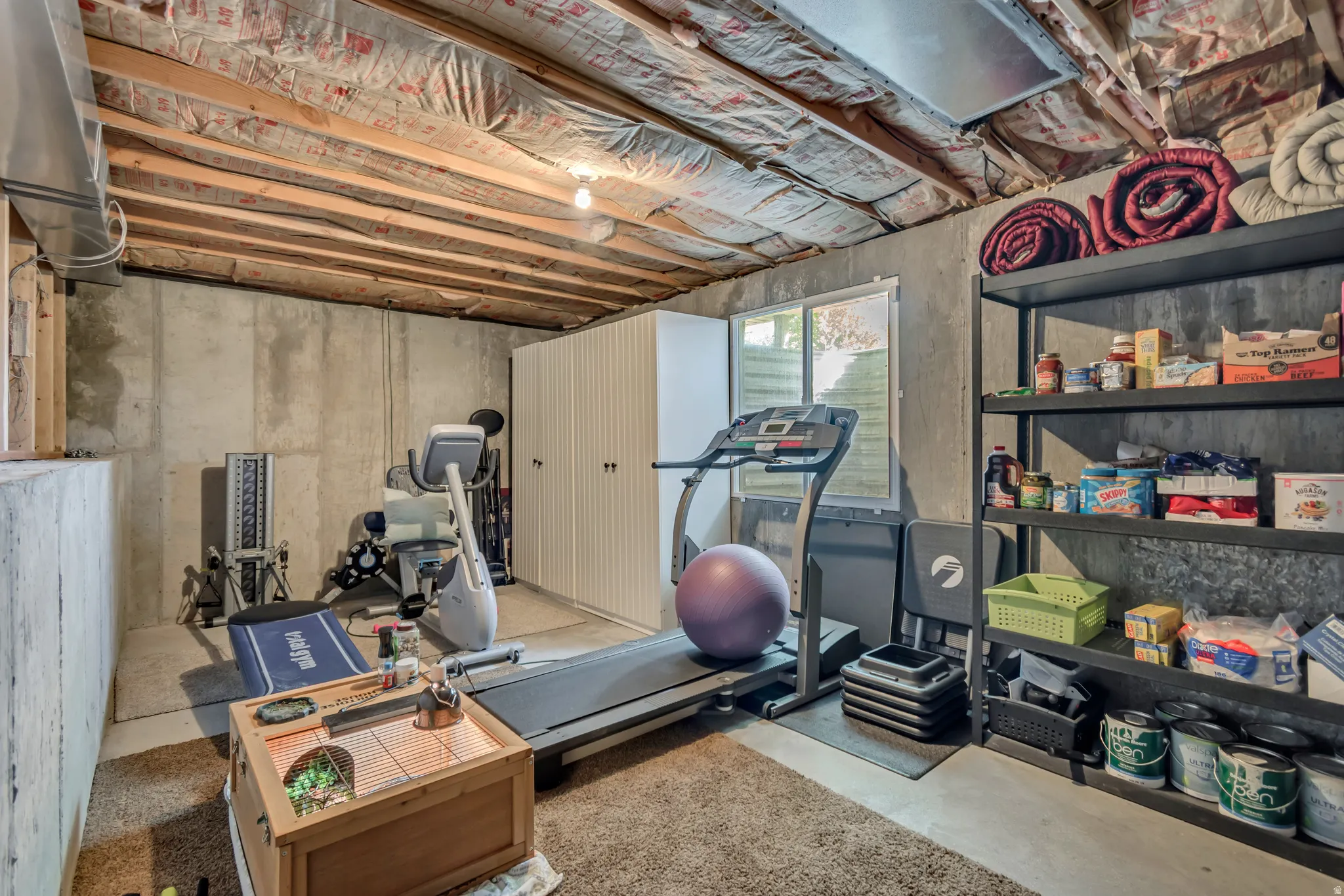 Exercise area featuring concrete flooring