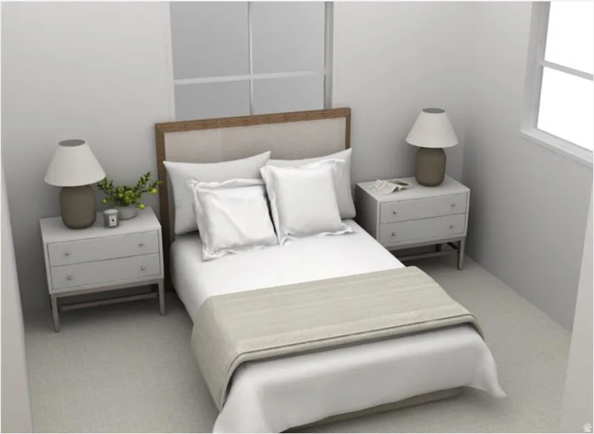 Bedroom with light colored carpet